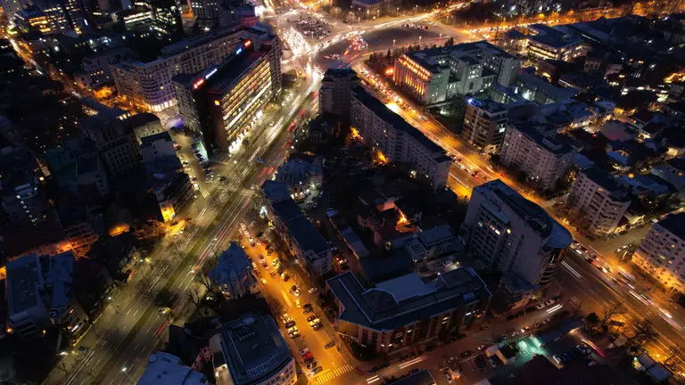 energy in all its forms - vibrant city by night showing how we need energy for lighting, transportation, confort of our homes