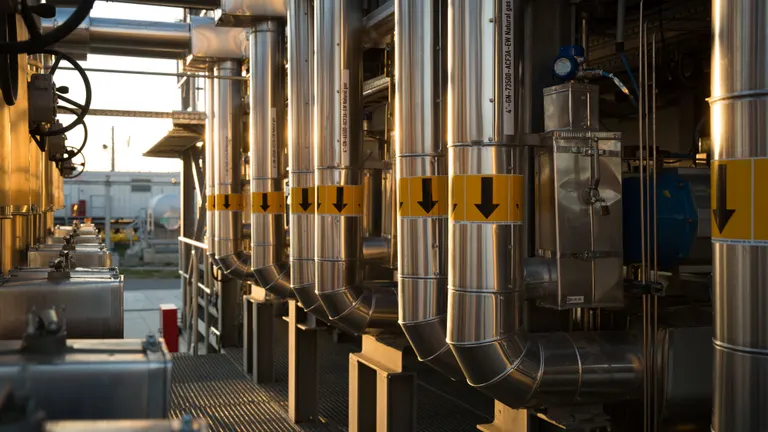 Gas pipes with arrows indicating the downwards flow